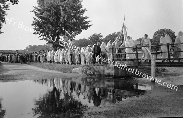 PROCESSION (C.O.M.) CROSSING RIVER